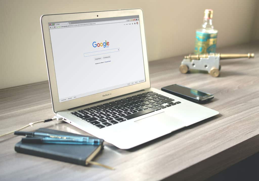 Laptop with Google homepage pulled up.