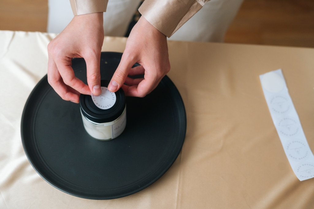Hand applied label on top of product.