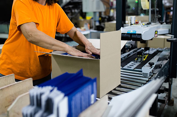 packaging folding cartons in shipping boxes